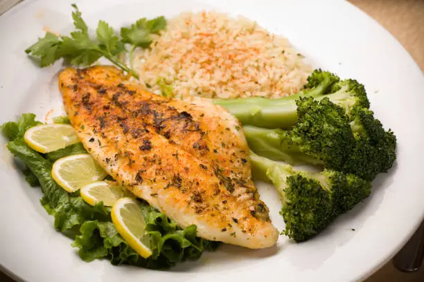 Photo of White Fish Fillet with Broccoli Spears