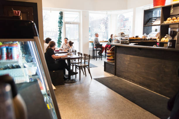 istock Customer enjoying time in a small local bakery shop. 926278822