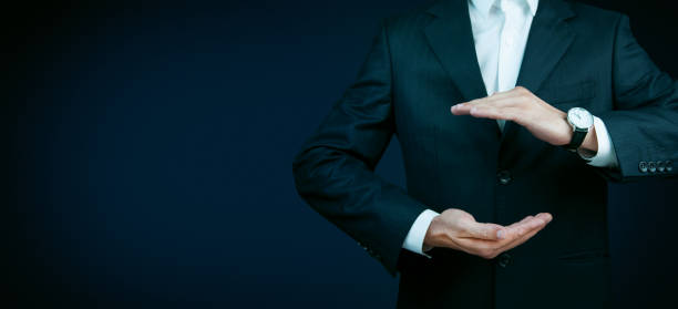 istock Businessman standing posture show hand isolated on over gray background 926282208