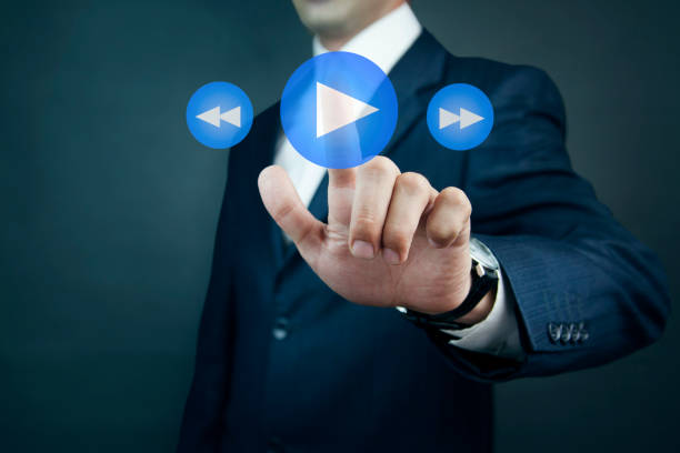 istock Businessman pressing play button to start or initiate projects 926282276