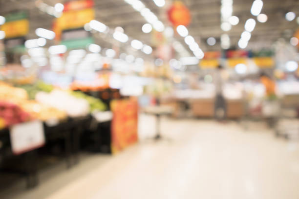 istock Abstract supermarket grocery store blurred defocused background with bokeh light 926283128