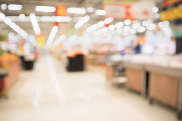 istock Abstract supermarket grocery store blurred defocused background with bokeh light 926283140