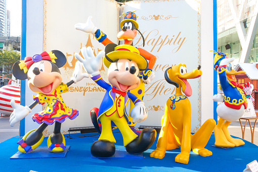 Bangkok, Thailand - December 30, 2015 : A Photo of Mickey Mouse and his Disney friends fiberglass mascots were set up for 2016 New Year Decoration Photo-booth in front of Central World, Department store in Bangkok, Thailand, in Happy Fairy Tale concept. The event is free of entry. Editorial use only.