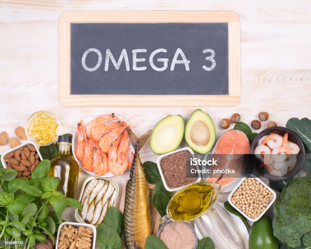 Food rich in Omega 3 fatty acids Food rich in Omega 3 fatty acids, top view with a small blackboard Omega-3 Stock Photo