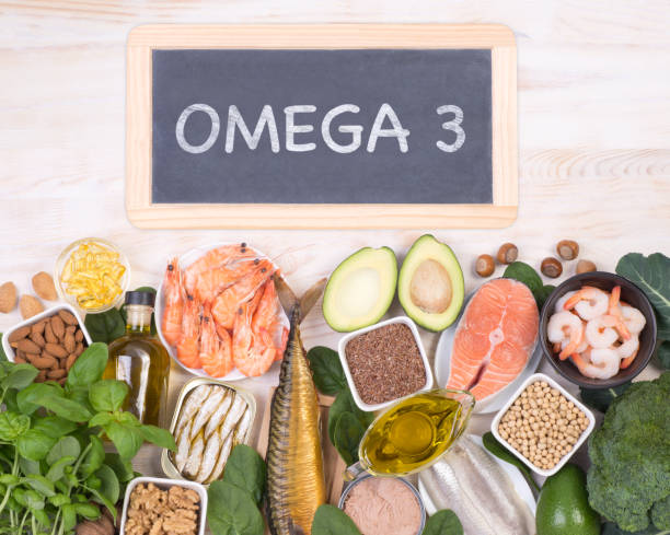 Food rich in Omega 3 fatty acids Food rich in Omega 3 fatty acids, top view with a small blackboard omega 3 stock pictures, royalty-free photos & images
