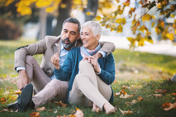 Mid aged couple in a park