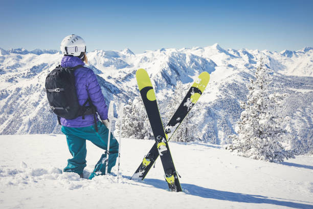 istock Female skier looking at the mountains 926291364