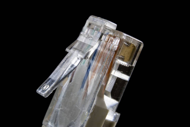 istock Electrical connectors at high magnification. Computer and electrical clamps and plugs shown in macro technology. Light background. 926291456