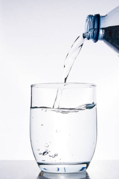 istock Pouring water into a glass 926294238