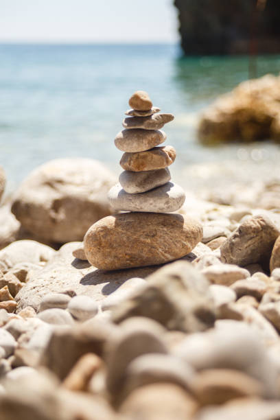 istock stone tower made of pebbles on the beach 926294532