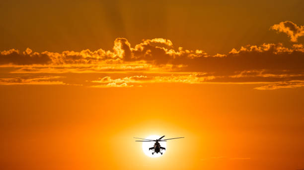 istock Russian Combat helicopters, warm sunset 926306848