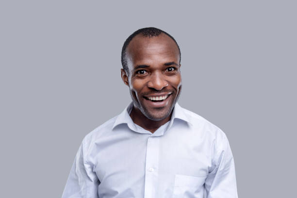 istock Content dark-eyed afro-american man smiling 926315982
