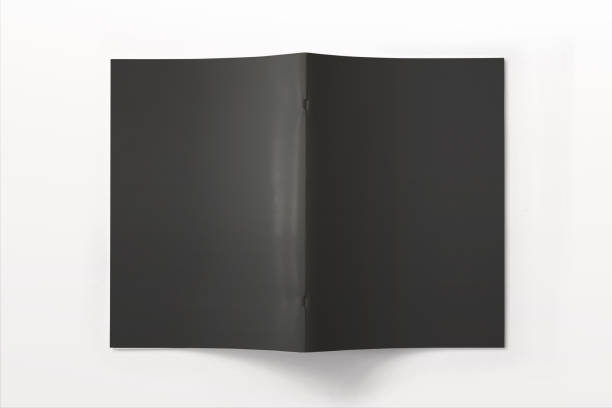 istock Portrait Magazine with black soft cover isolated on white. 3d illustration. 926321088
