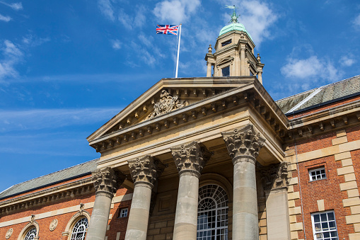 Looking up at the magnificent facade of Peterborough Town Hall, home of the Peterborough City Council, in Peterborough, UK.