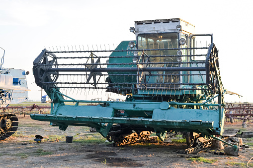 Poltavskaya village, Russia - September 06, 2017: Combine harvesters Agricultural machinery. The photo was taken at a parking lot of agricultural machinery near the village of Poltavskaya.