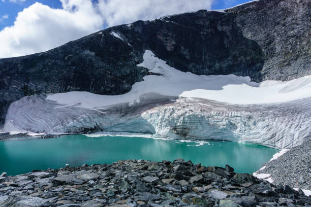 istock Glacier in Norway with blue sky and clouds 926358592