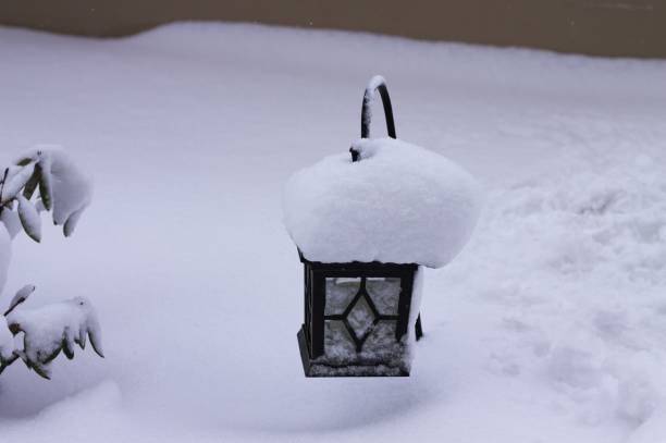 istock Snowy lantern isolated in the garden (Pesaro, Italy) 926359312