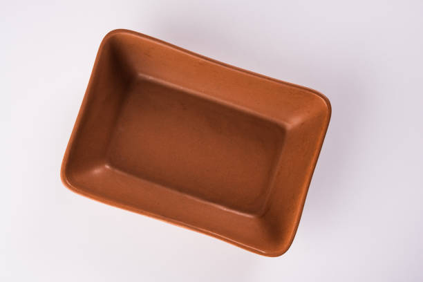 istock empty terracotta serving bowl of square or oval or round shape 926361664