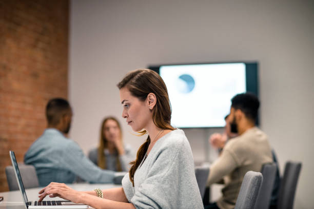 istock Colleagues at a small conference room 926362596
