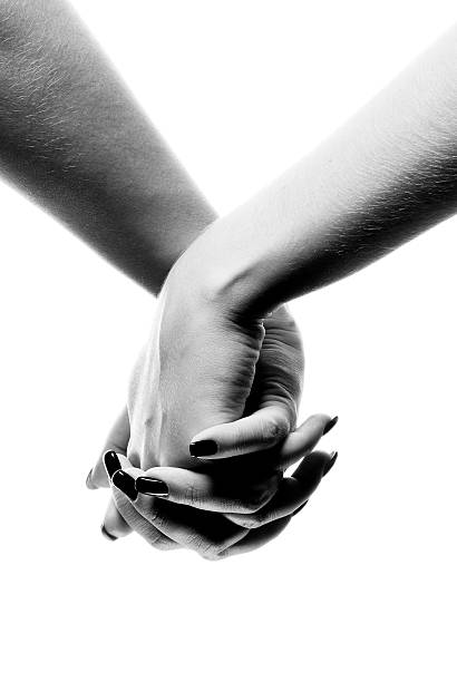 istock Holding hands in black and white on a white background 92636335
