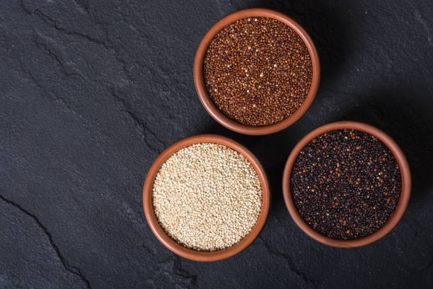 istock Black , white and red quinoa in spoon 926369054