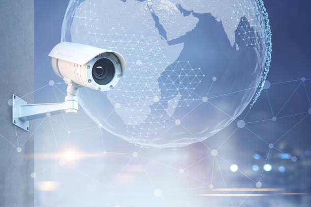 istock CCTV camera, Earth in a city sky 926373496
