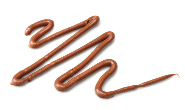 istock milk chocolate sauce isolated on a white background 926376718