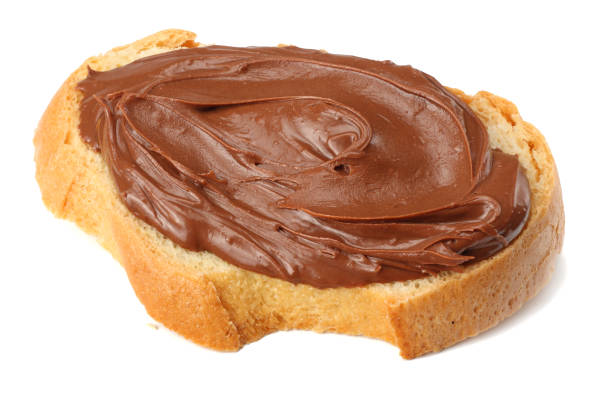 istock Slice of bread with chocolate cream isolated on white background 926376730