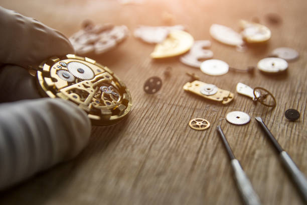 istock Watchmaker is repairing the mechanical watches in his workshop 926378900