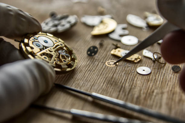istock Watchmaker is repairing the mechanical watches in his workshop 926378948