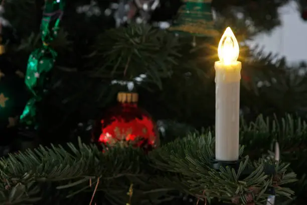 electric candle on a christmas tree