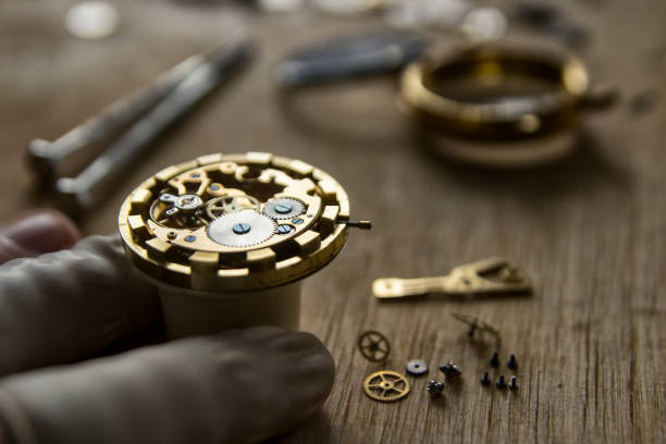 istock Watchmaker is repairing the mechanical watches in his workshop 926379216