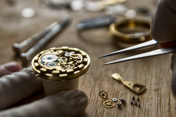 istock Watchmaker is repairing the mechanical watches in his workshop 926379326