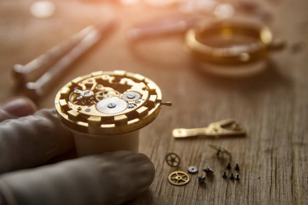 istock Process of installing a part on a mechanical watch, watch repair 926379332