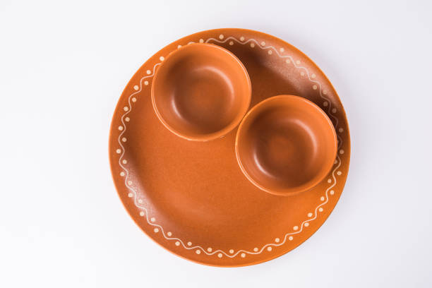 istock Empty terracotta bowl or brown clay serving bowl isolated on white 926382904