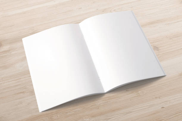 istock Opened magazine or brochure on wooden desk. 3d render. 926383298