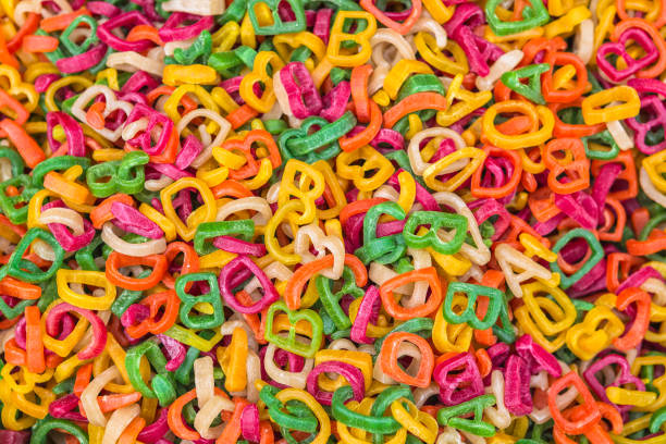 istock Food background - uncooked colored wheat pasta 926393160