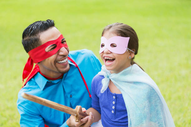 istock Father and daughter superheroes 926396056