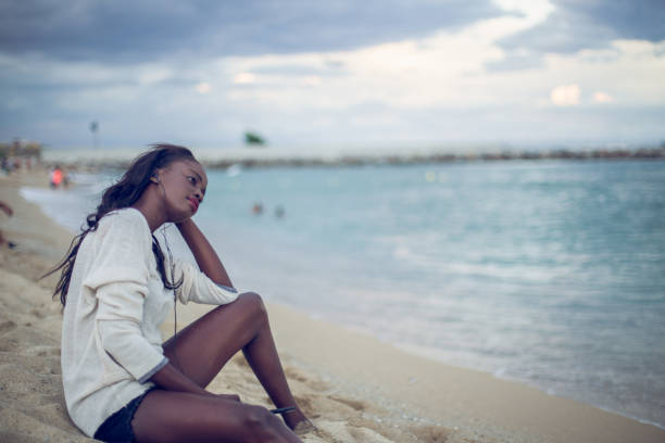 istock Girl resting on the beach 926397048