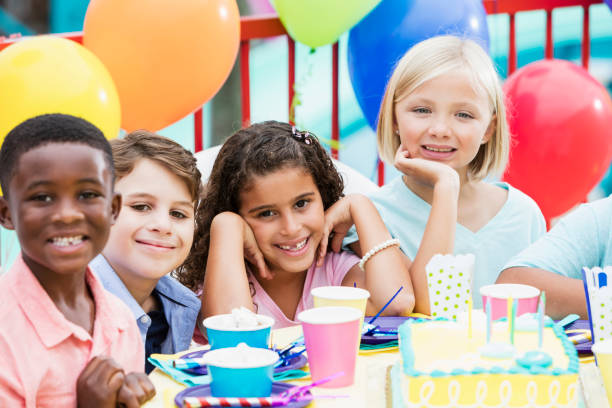 istock Multi-ethnic children at birthday party 926404056