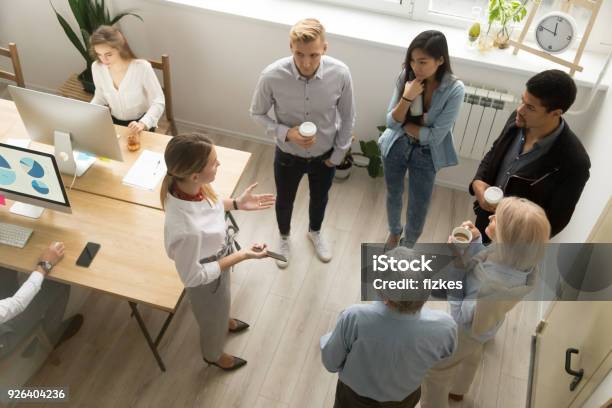 Team Leaders Meet Multiracial Interns In Coworking Office Top View Stock Photo - Download Image Now
