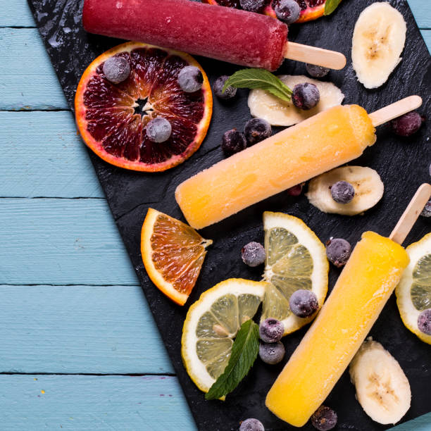 istock Colorful popsicles with fresh fruits. Summer refreshing icecream 926407698