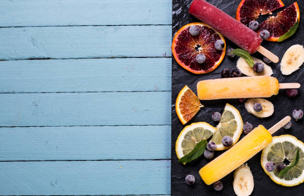 istock Colorful popsicles with fresh fruits. Summer refreshing icecream 926408562