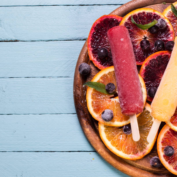 istock Colorful popsicles with fresh fruits. Summer refreshing icecream 926411250