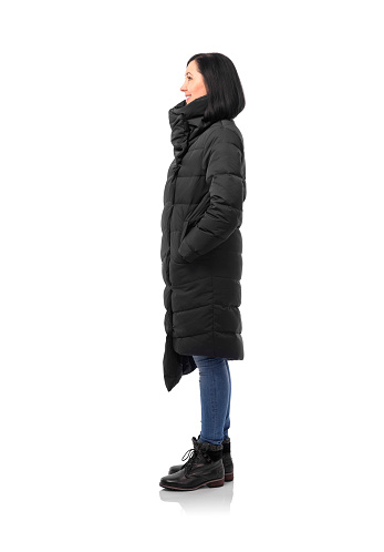 Attractive Woman In A Down Jacket Isolated On White Stock Photo ...