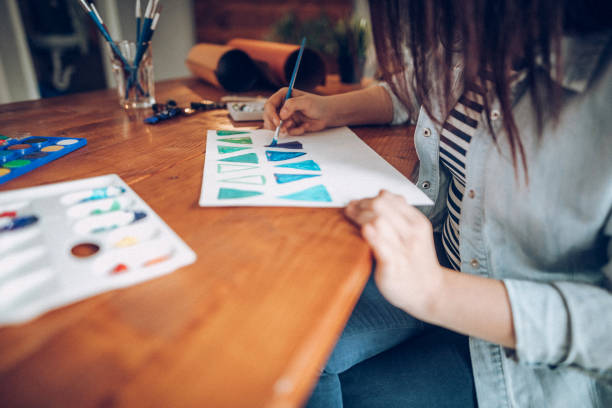 istock Young artist learning how to draw shapes 926424666
