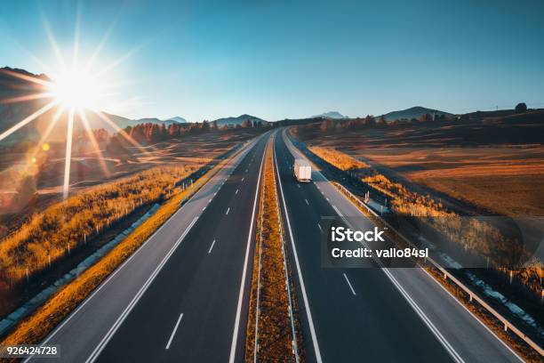 Driving On Open Road At Beautiful Sunny Day Aerial View Of Highway Stock Photo - Download Image Now