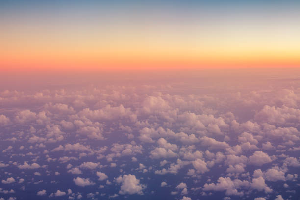 istock Sky sunset. Flying above the clouds. Aerial view from the airplane. 926427212