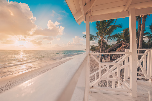 Punta Cana sunrise over Caribbean beach  with lifeguard station.