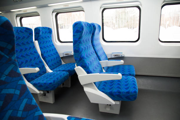 Train interior chairs train with chairs visible train interior stock pictures, royalty-free photos & images